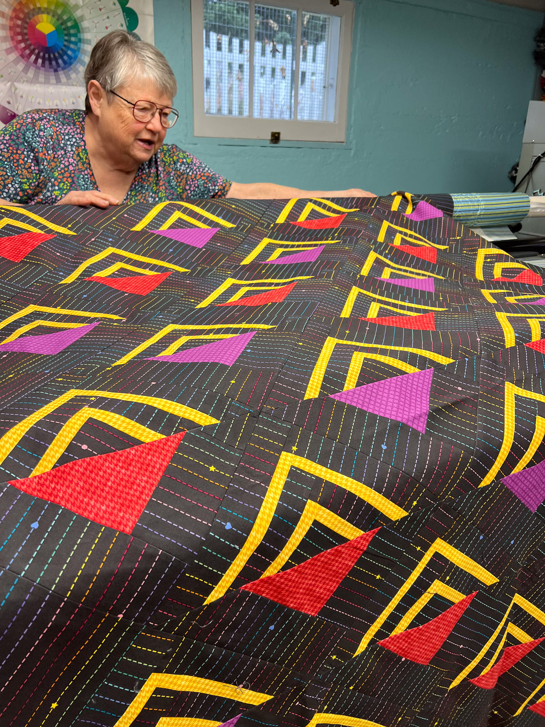 Betty trapped in the basement with her mystery quilt